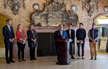 photo of Mark Bonne addressing the press regarding Friends of the Coronado and planned renovations of the historic Coronado Theatre